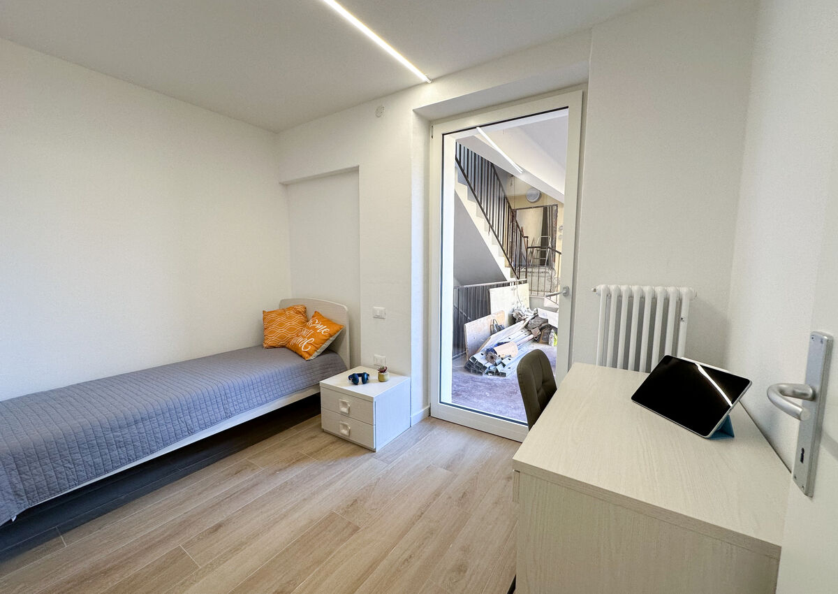 ROVERETO - Valbusa 1 - lato nord - Stanza 2 