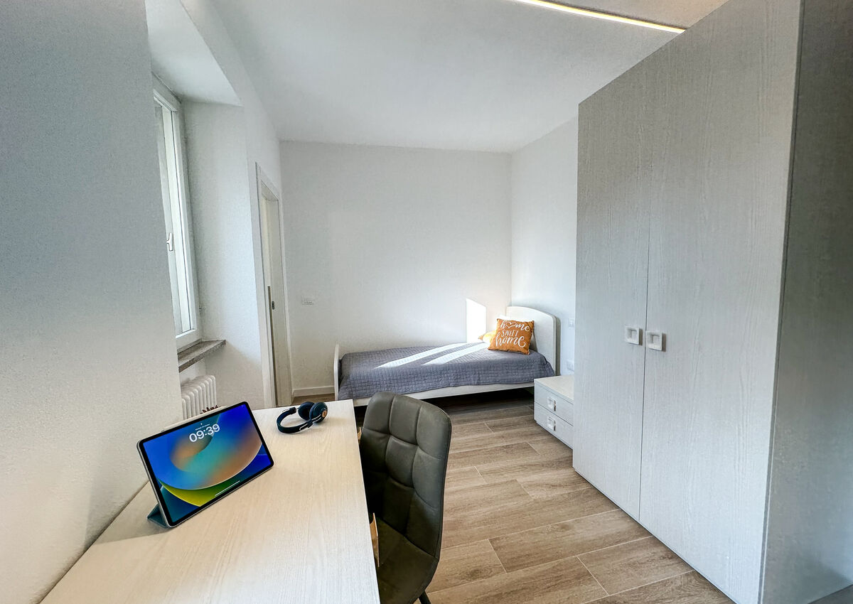 ROVERETO - Valbusa 1 - lato nord - Stanza 6